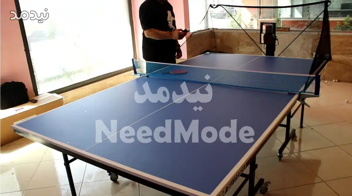 ربات پینگ پنگ نیدمد نصب شده روی میز تمرین